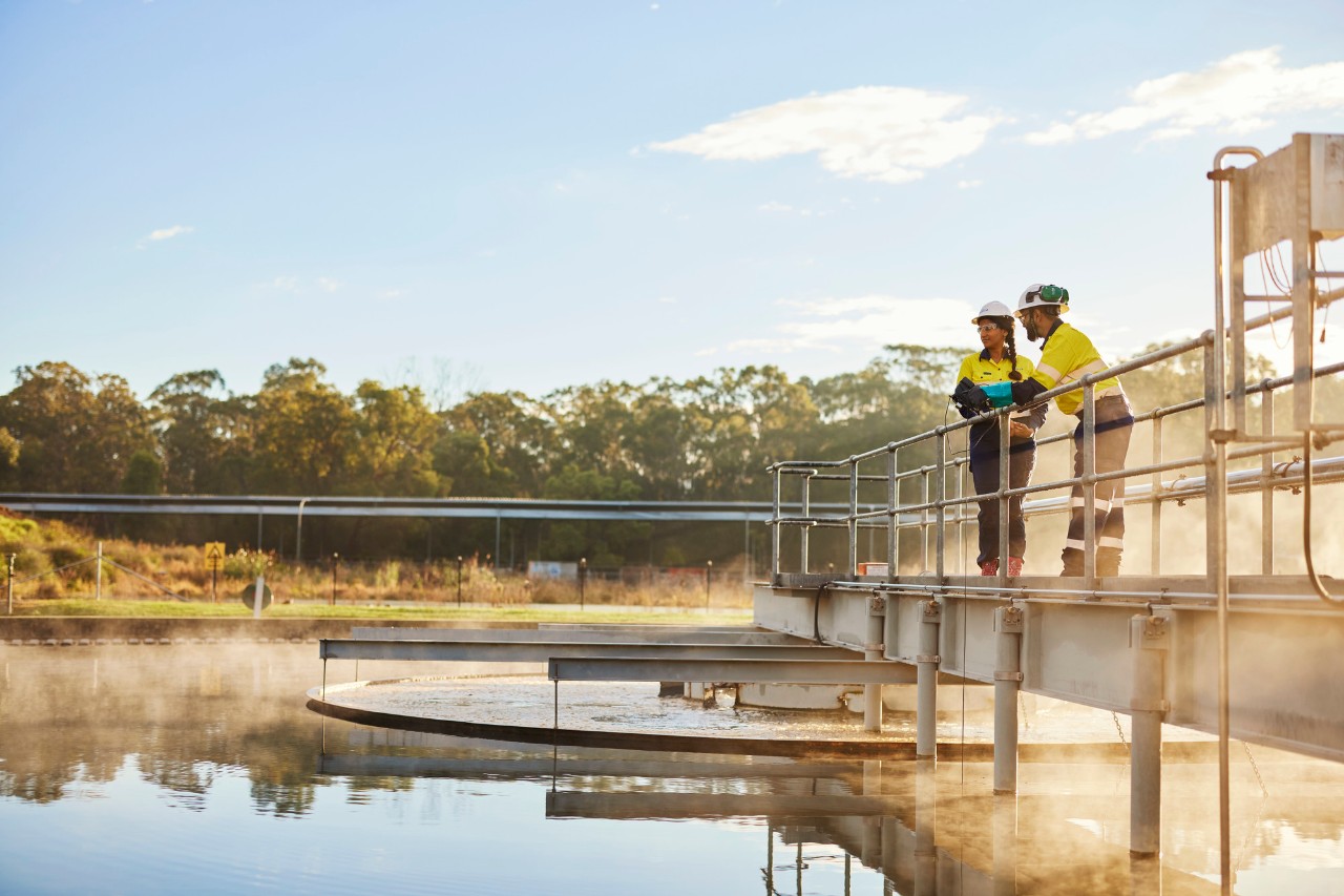 Staff testing wastewater over a clarifying tank at St Marys