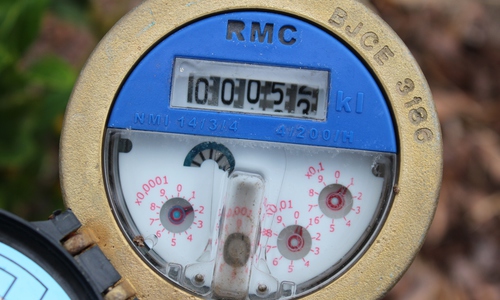 RMC water meter with the dials open