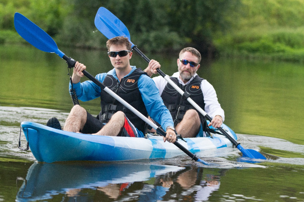 People kayaking on the river.