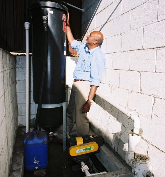 Sydney Water representative inspecting pre-treatment 