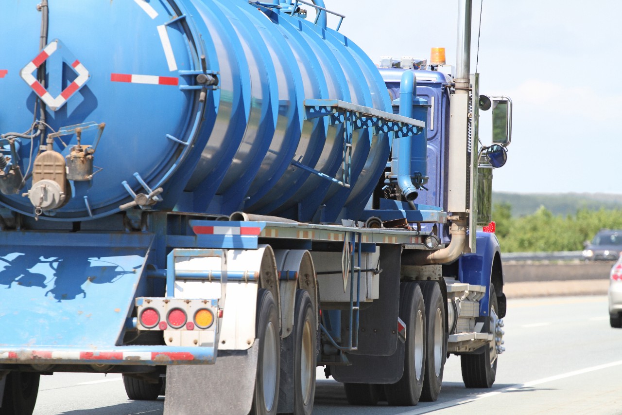 Waste tanker on road